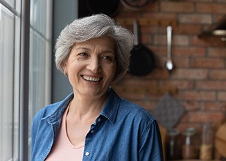 Woman smiling with dentures