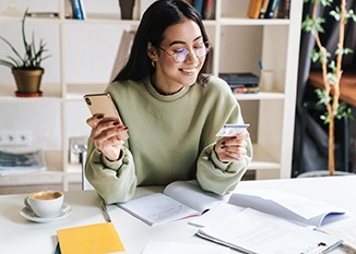 Woman using a credit card