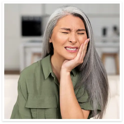 Closeup of woman experiencing toothache